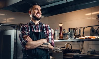 restaurant owner wearing apron