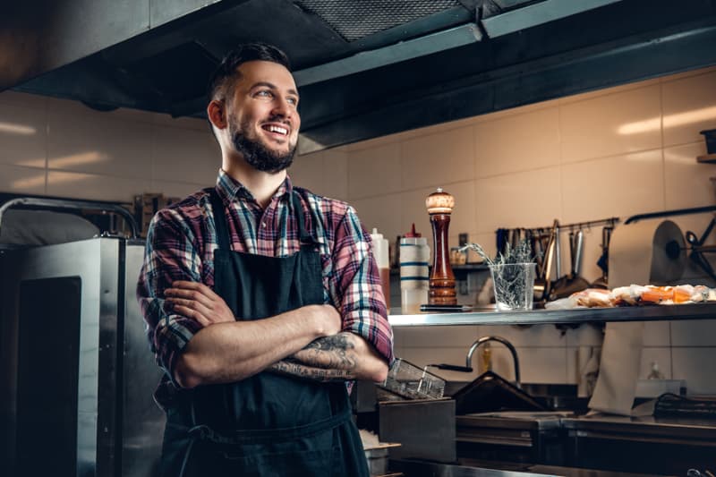 restaurant owner wearing apron