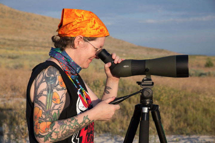 woman tatooed with scope