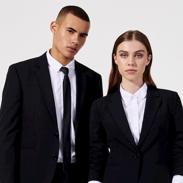 man and woman wearing corporate wear