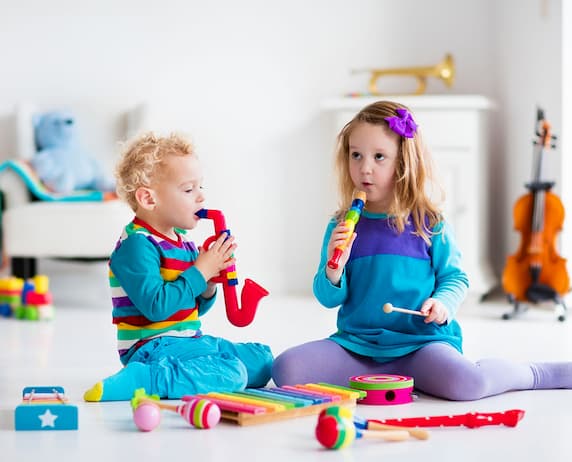 children playing with musical toys