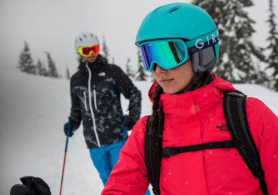Guy and Girl Skiing