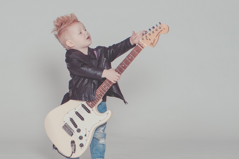kid with electric guitar