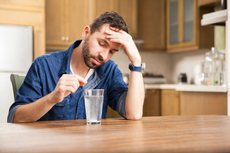 men taking pills antacid