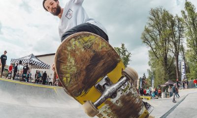 picture of a man riding a skateboard in skateboarding park