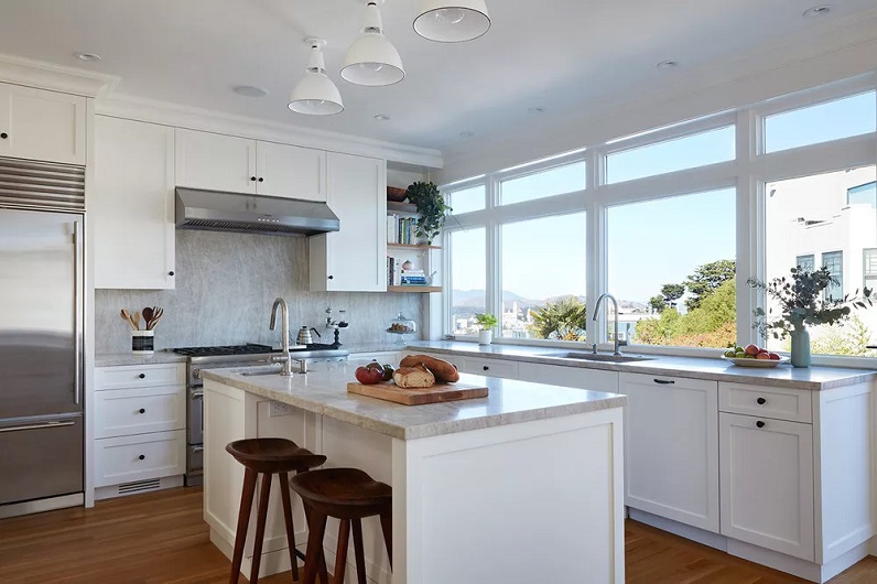 picture of a modern kitchen with a marble countertops 