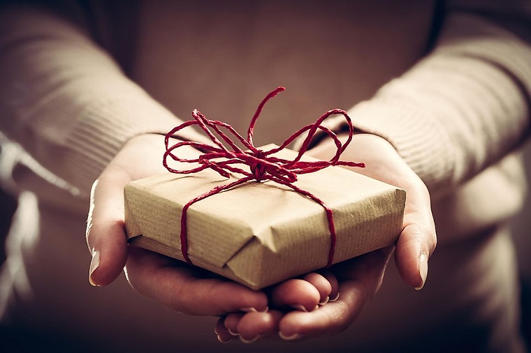 holding gift in hands