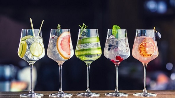 five fancy prepared glasses of gin and tonic