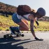 girl riding an electric skateboard