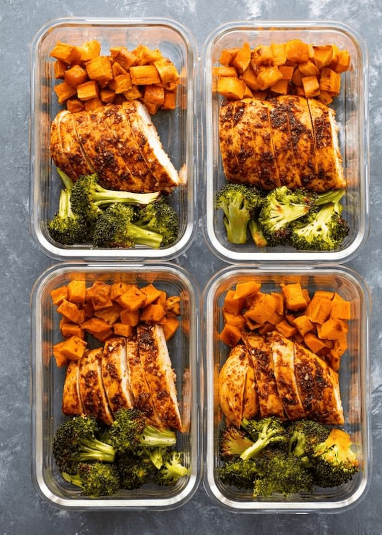 meal prep with meat sweet potato and broccoli stored in flass containers