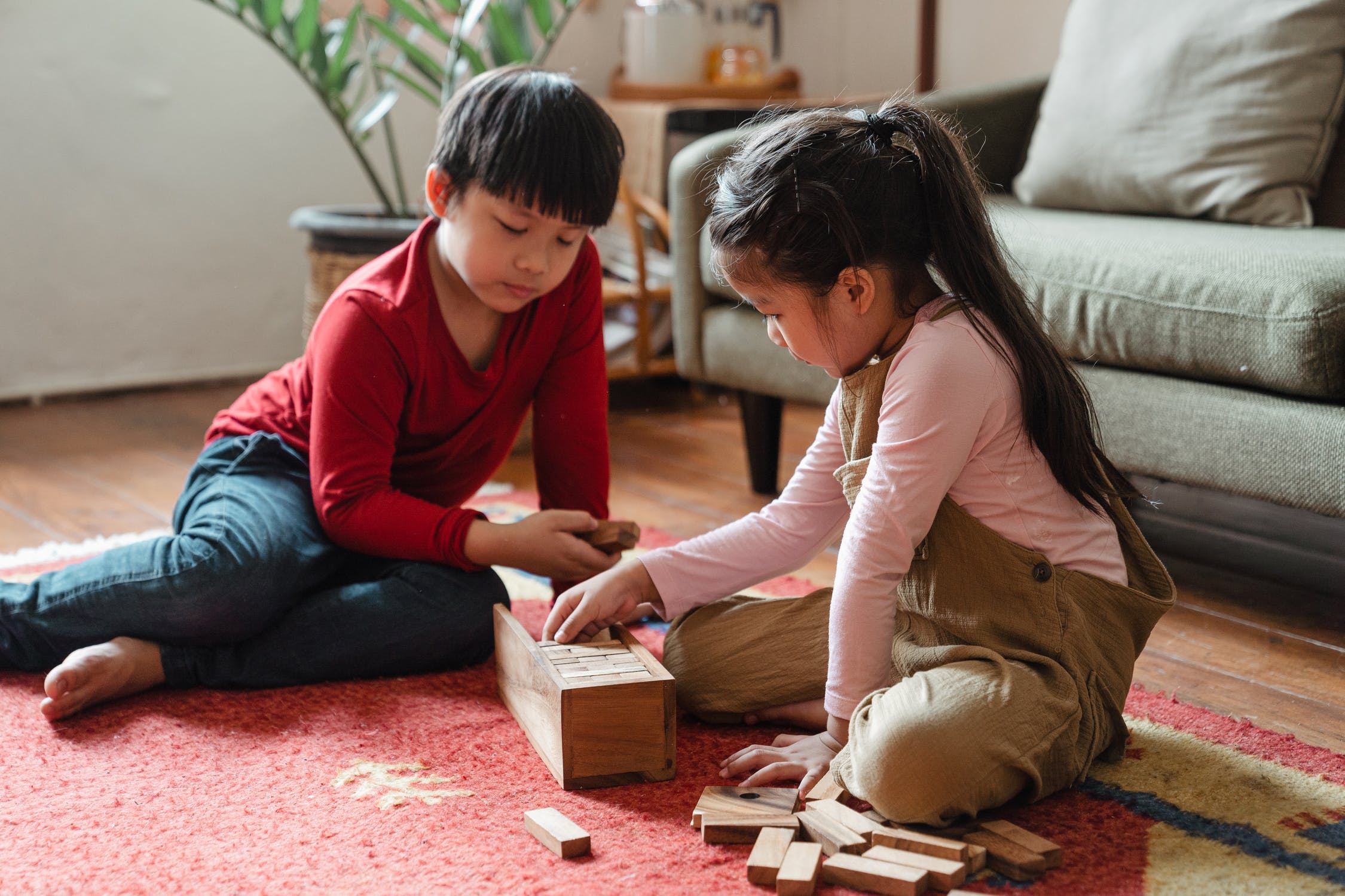 kids playing on rug