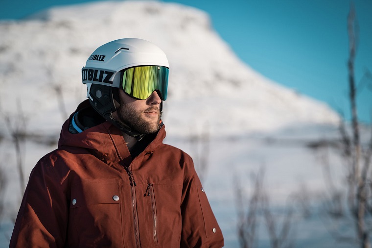 Man with a snowboard helmet