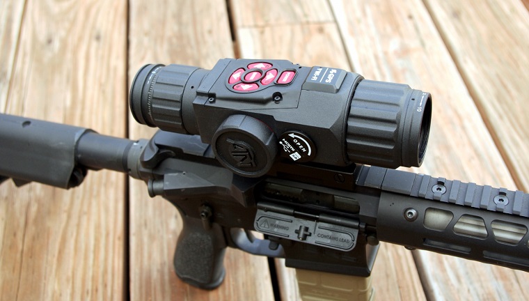 Close-up of night vision scope attached on a rifle