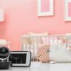 picture of a baby monitor beside a crib