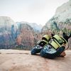 Rock Climbing Shoes on a rock from the brand La Sportiva