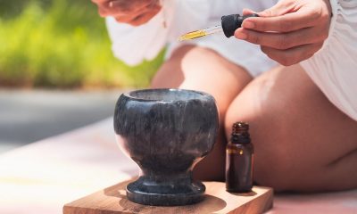 picture of woman outside making an essential oil