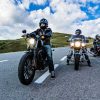 Three riders on Motorbike on the road