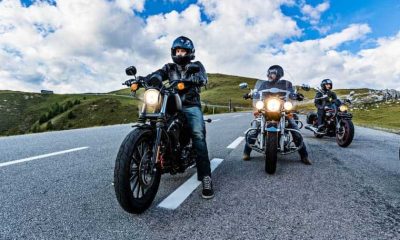 Three riders on Motorbike on the road