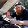 bearded men holding car battery monitor from Ultimate9