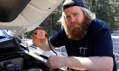 bearded men holding car battery monitor from Ultimate9